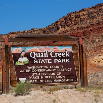 Signage for Quail Creek State Park near Hurricane, Utah. "Washington County Water Conservancy District - Utah Division Parks & Recreation - Bureau of Land Management"